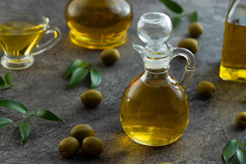 high-view-bottles-filled-with-olive-oil-marble-background (3)